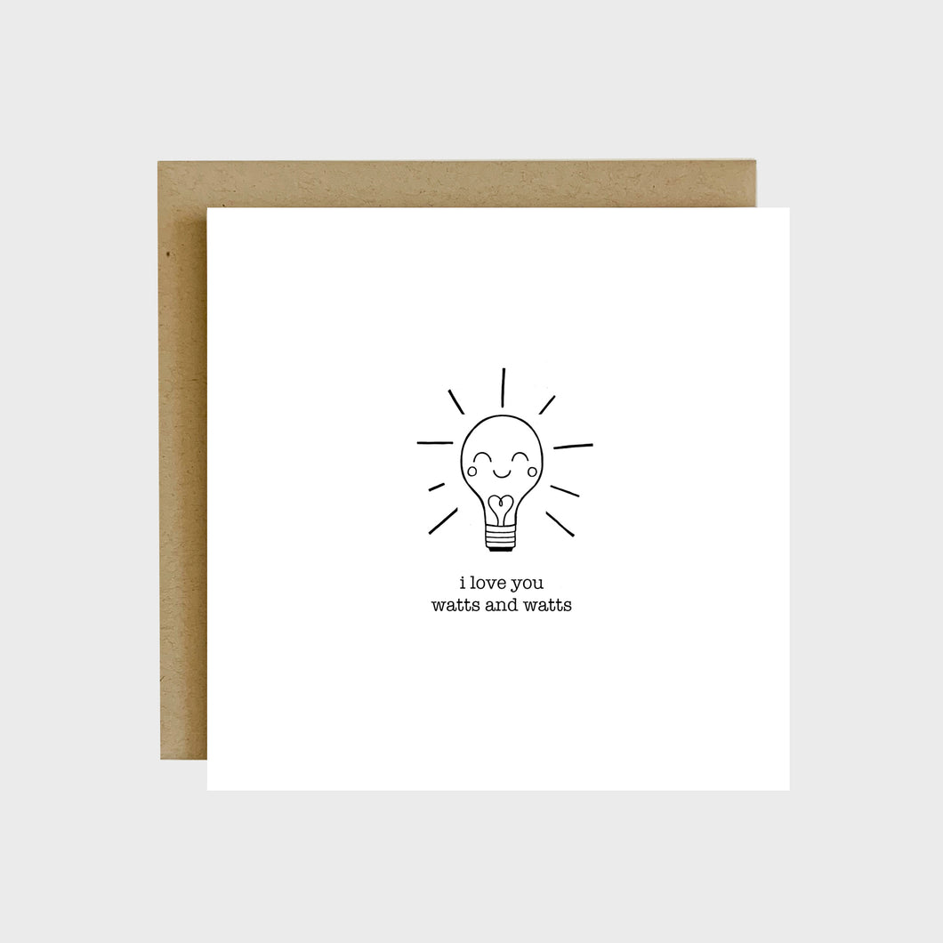 A funny greeting card featuring a lit light bulb with a heart inside and text that reads, I love you watts and watts.